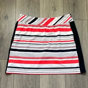 Tail, Sz M, white, black,(orange) red, golf skort. Pockets, activewear.